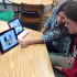 Lane Barnes, junior shows fellow class mate Bobby Harrison how to use Polyvore.