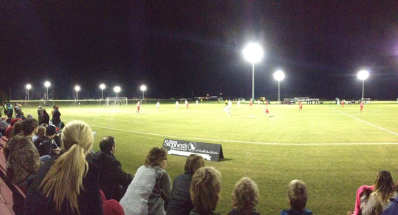 Fans watch as Tampa Prep charge the ball