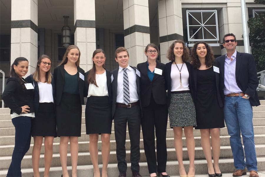 From left to right: Attorney Coach Maite Clarke, Miranda Carrassi '17, Alana Shukovsky '17, Sabel Duncan '16, Ben Kalish '15, Sabrina Priestley '16, Devon Sullivan '16, Valerie Arias '15 and Attorney Coach Jimmy Delgado
