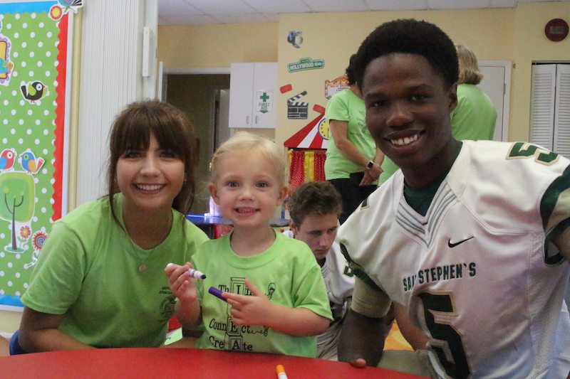 Seniors Emily Tobias and Demetrius Davis wear their school spirit, but only on Fridays. 