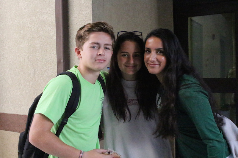 Juniors Jake Manning and Rena Parent, along with sophomore Emily Clark, sport spirit shirts on Friday.  Friday is the only day one can wear a athletic uniform or shirt. 