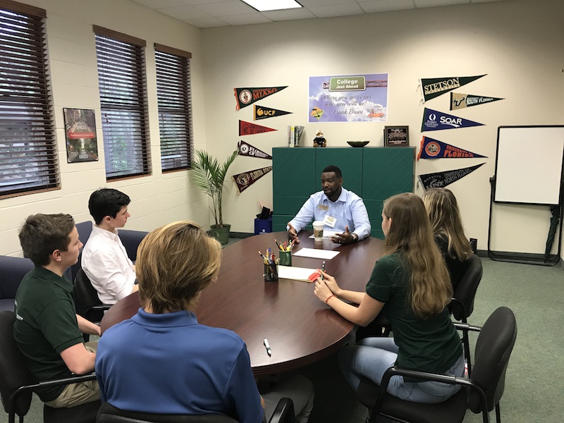 Saint Stephens students meet with Emory University representative.