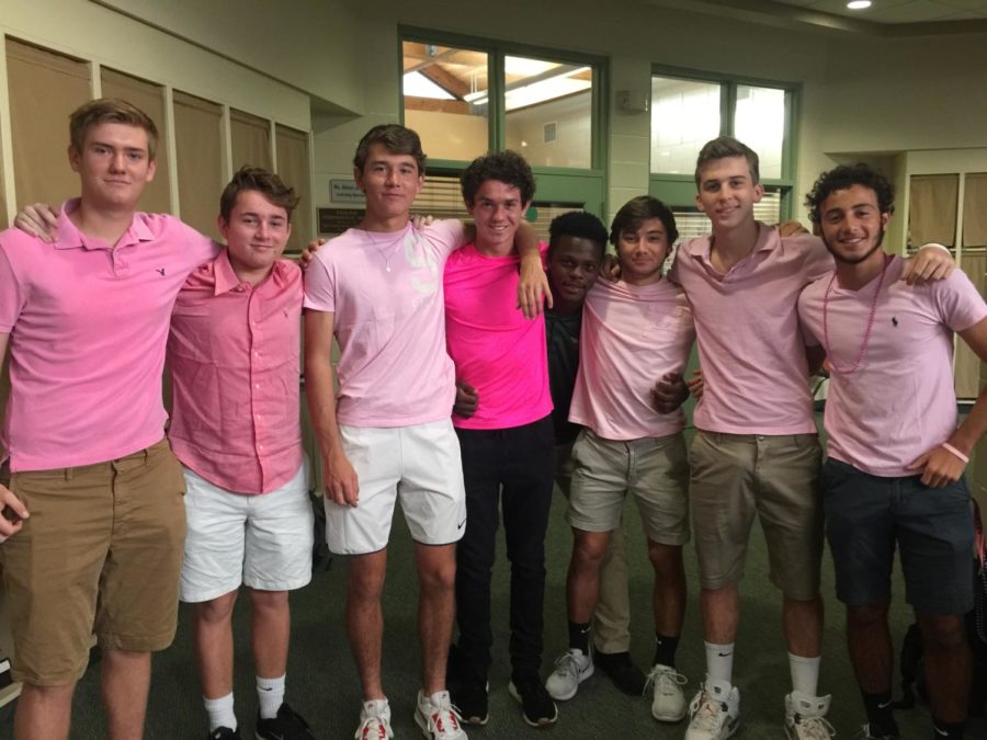 Junior boys wearing pink in support of Tammy ODells struggle with cancer.