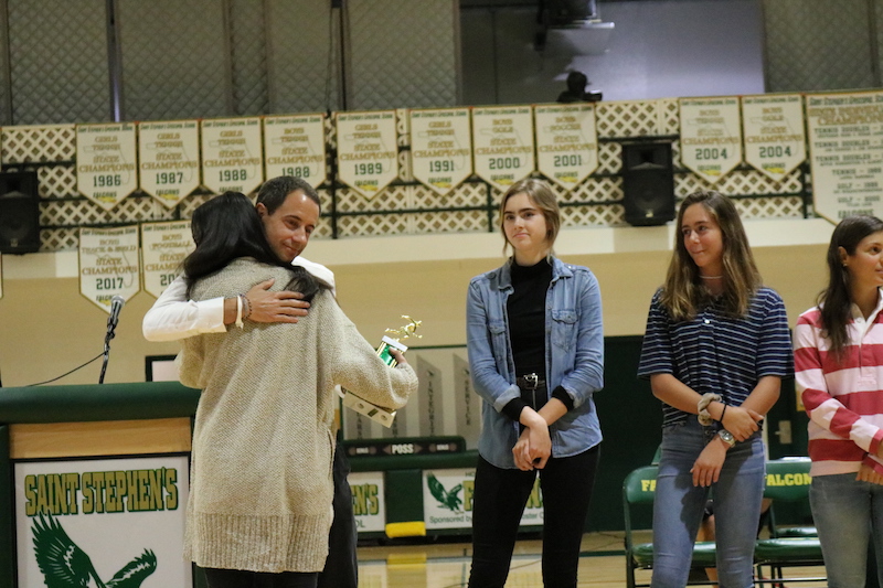 Varsity+soccer+coach+shaves+head+at+Fall+Sports+Awards