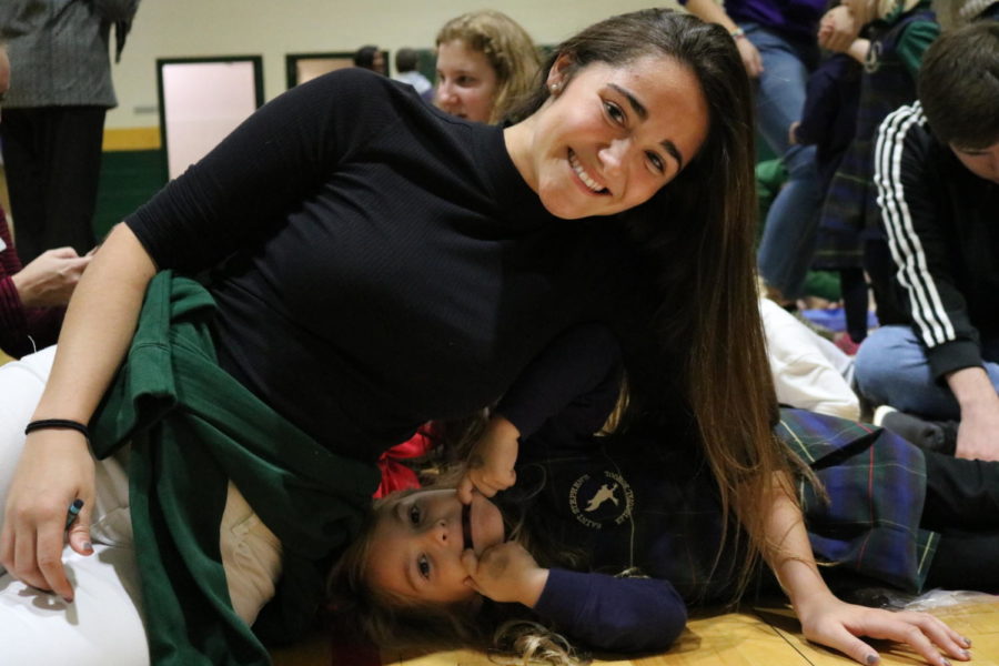 Senior Ashleigh Roadhouse and her falcon friend pause for a funny photo. 