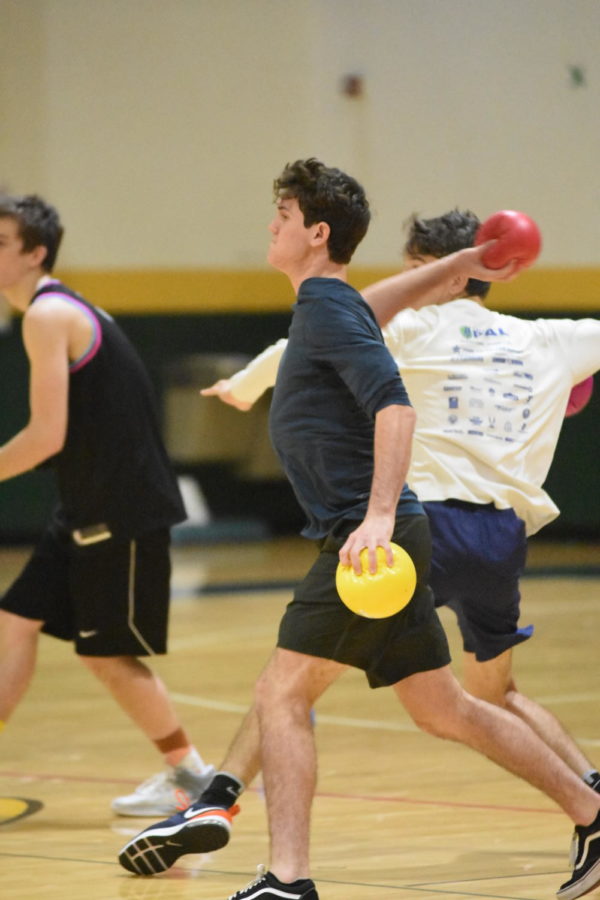 Junior Noah LaBelle sauces the rock during a dogeball showdown.