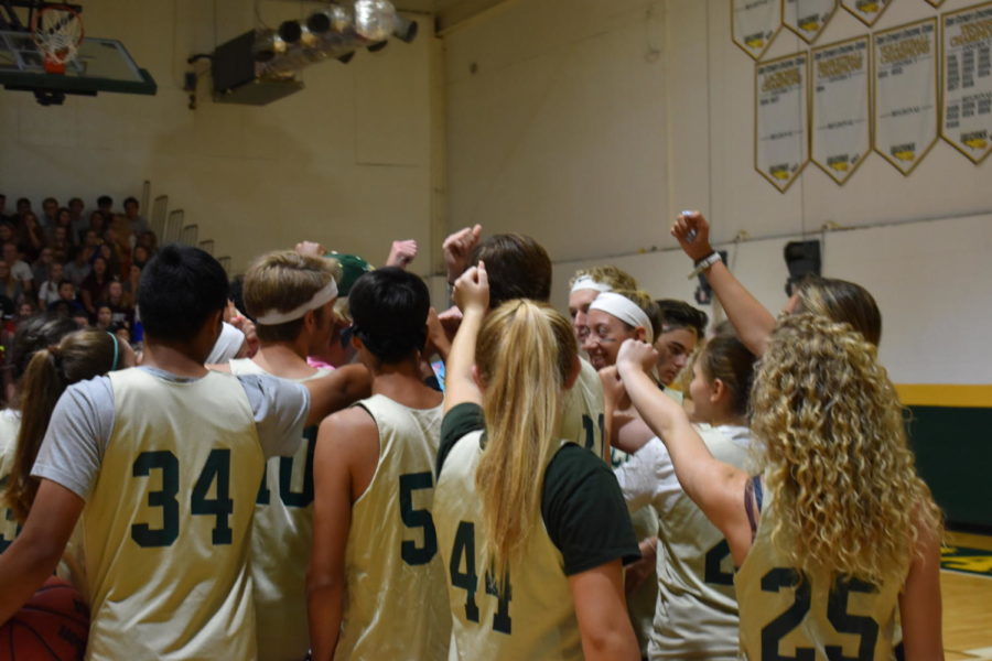 The student team prepares to break at the start of the first half.