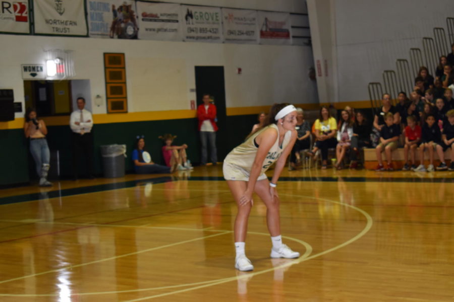 Senior Demi Harms gets low as she prepares to play defense.