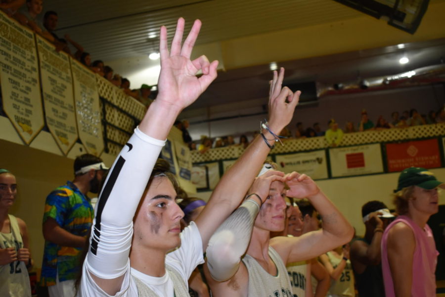 Seniors Julian Sedillo and Wyatt Sevin celebrate a shot attempt in anticipation.