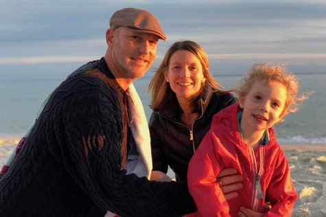 Rev Rich visiting the beach with his wife and daughter.