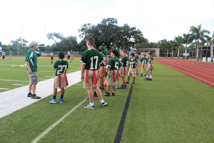 The new Saint Stephens flag football team player anxiously await a chance to compete.