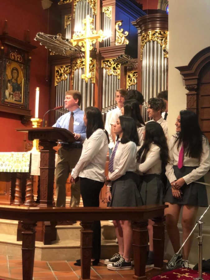  Mr. Whelan introduces the Argentinian students as they give their performance in chapel