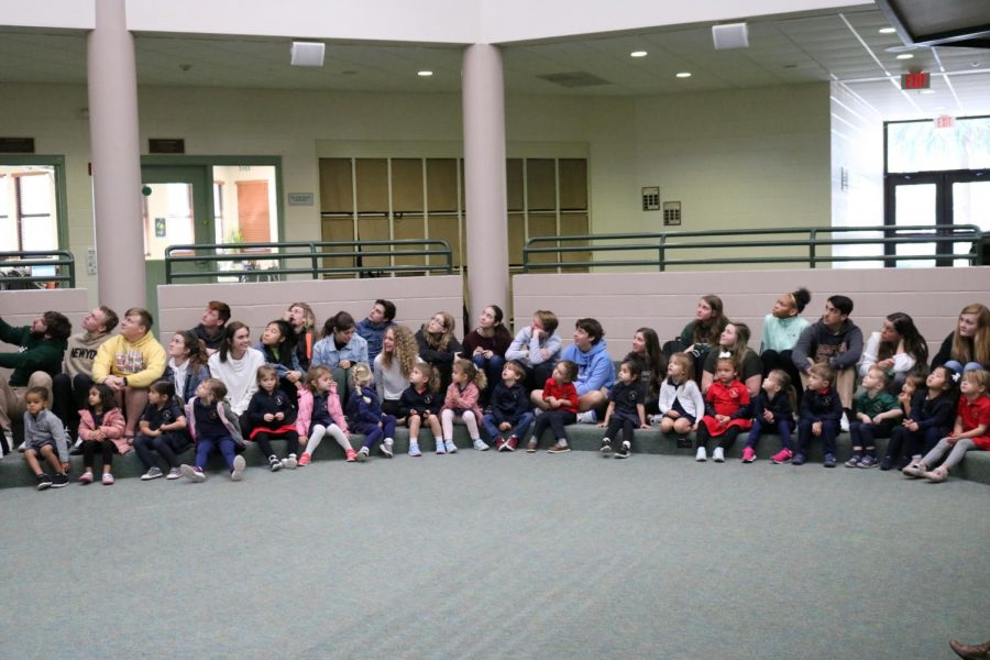 The Senior Class looks upon the Water Is Life video played during the Falcon Friend event