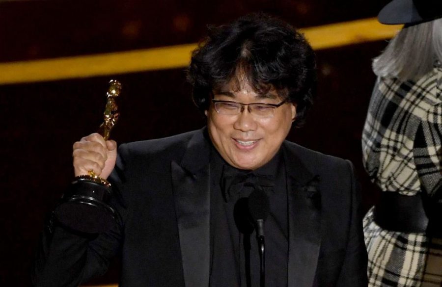 Bong+Joon-ho+accepting+the+Oscar+for+best+film.++This+was+the+first+time+a+foreign+film+got+the+honor.