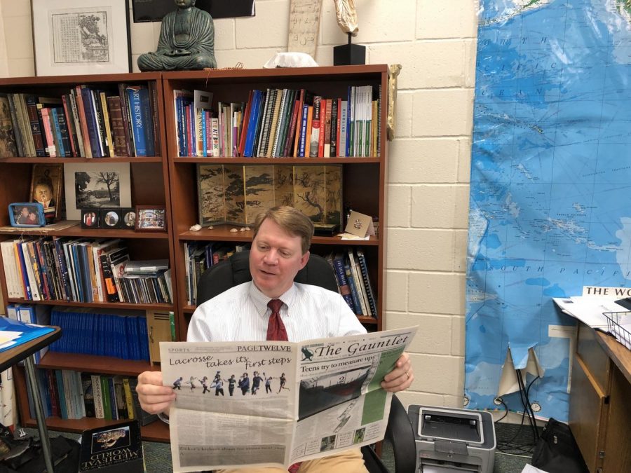 Mr. Whelan, reading an old edition of The Gauntlet, is one of the most committed readers of The Gauntlet.  