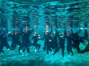 An underwater shot of the Marine students snorkeling. 