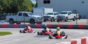 Rosser in action as he commands his go-kart around a track. 