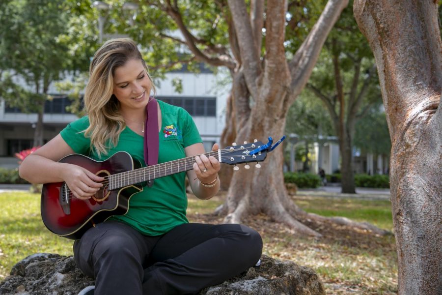 Stephanie Epstein, our special guest, strumming the ukulele.