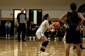 Jamie Springstead shoots her record breaking free throw. Photo taken by Bella Rosa.