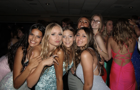 Sophomores Isabella, Sienna, Sofia and Julia and juniors Sophia and Paige appreciate time together at prom.