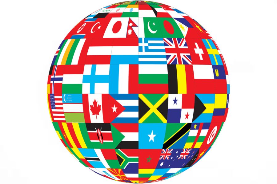 Globe+showcasing+various+flags+belonging+to+different+counties+around+the+world.