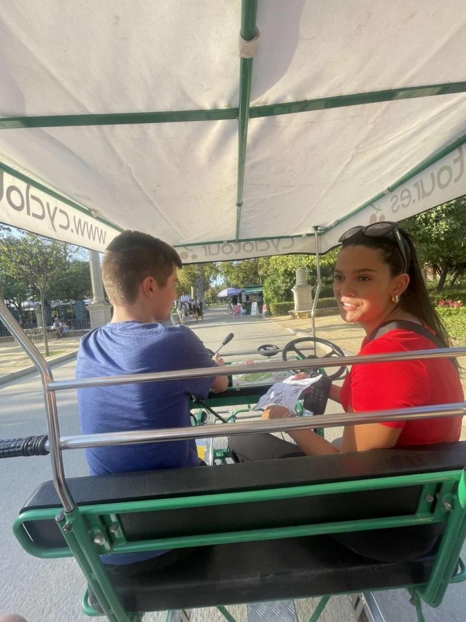 Seniors Jackson Nealis and Sophia Creneti cycle through Seville’s famous María Luisa park on a scavenger hunt.