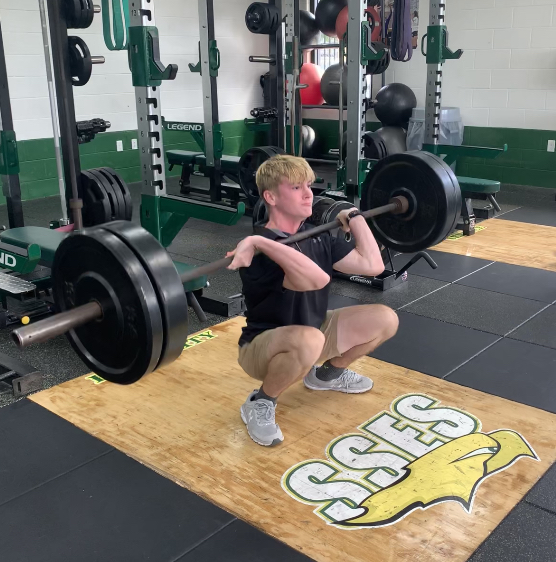 Bryson Shrimplin performing a Clean and Jerk exercise.  