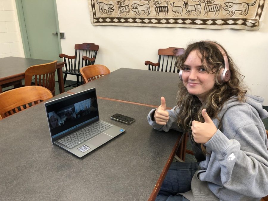 Senior Amelia Sabo poses for a photo as she collaborates with her partner.    