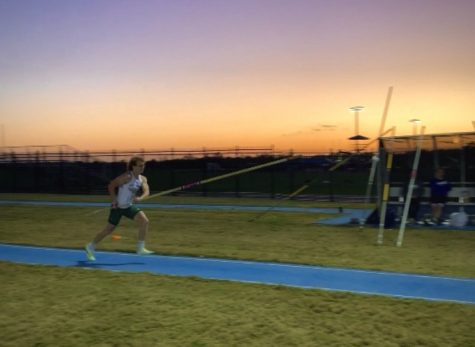 Senior vaulter, Joshua Sket, begins his approach for pole vaulting.
