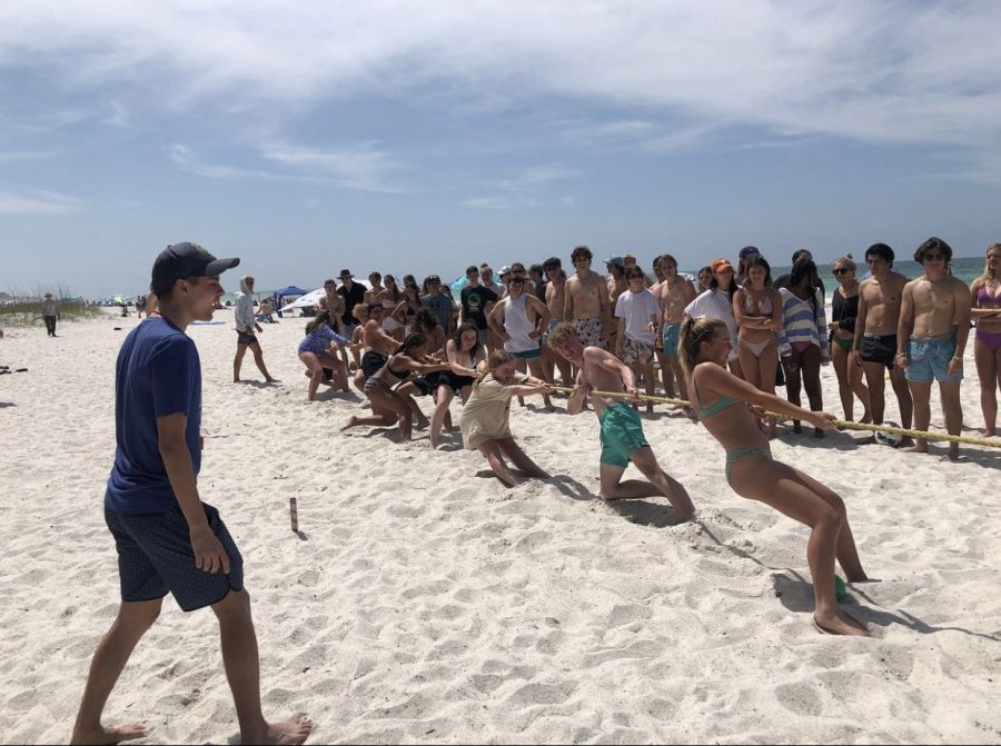 The freshman work hard to keep up in tug of war.