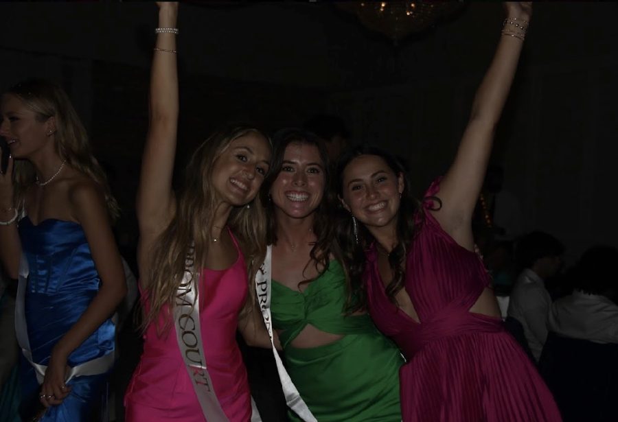 Seniors Maddie Castellucci, Bella Rosa and Kate Baran celebrate during their final prom.