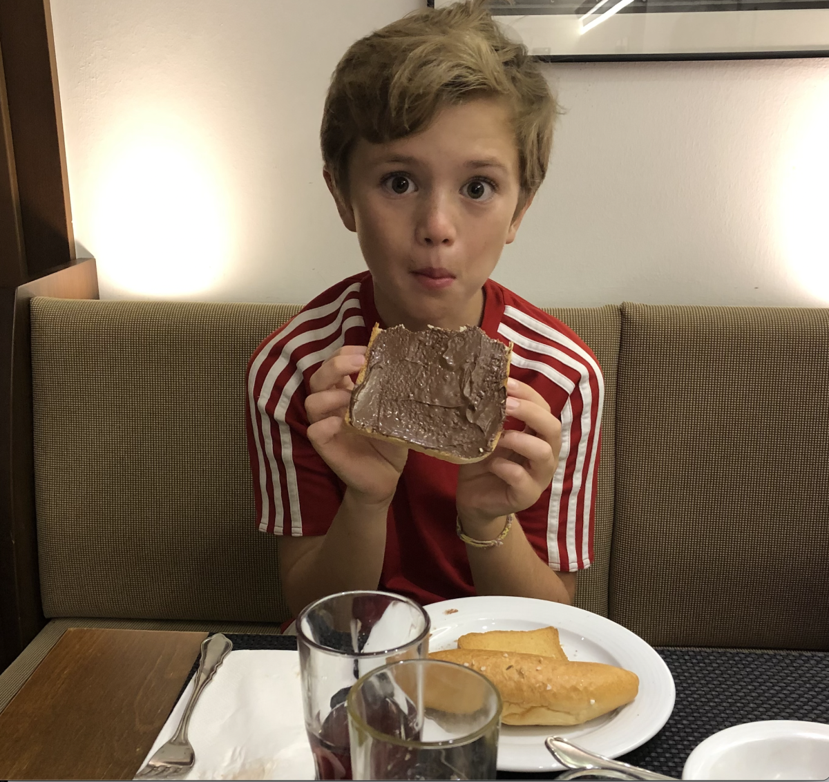 Here+is+a+portrait+of+the+author+as+a+young+man+devouring+a+chocolate-covered+piece+of+bread.