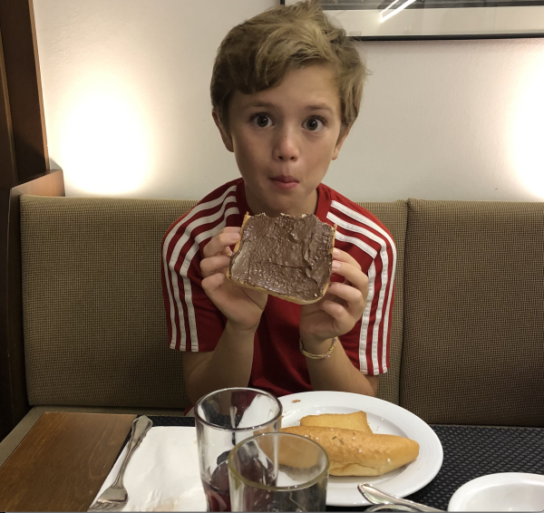 Here is a portrait of the author as a young man devouring a chocolate-covered piece of bread.