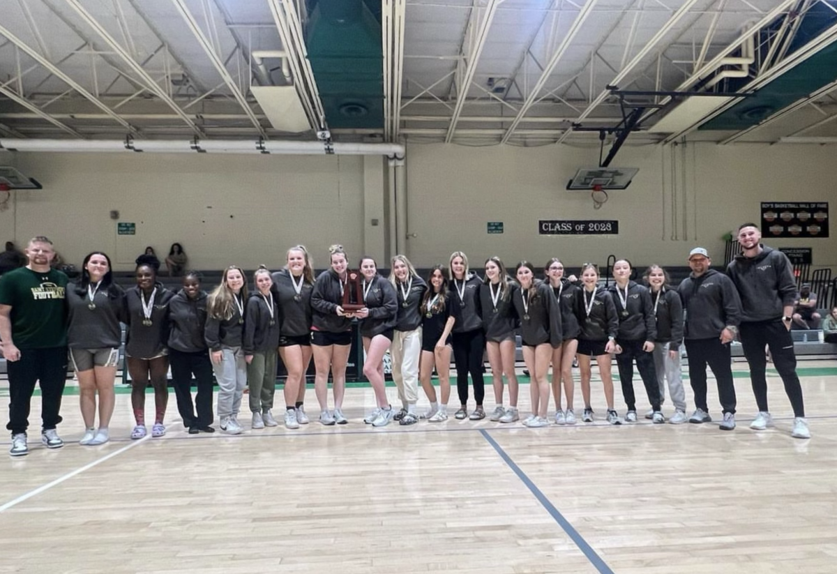 The lady lifters after winning the District title in both traditional and olympic lifts.