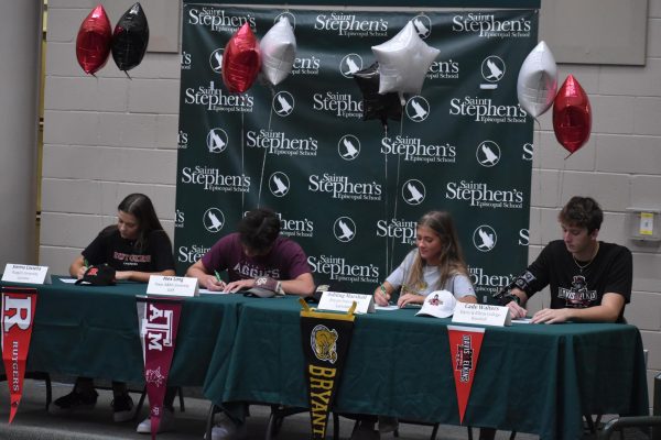 Finally the moment has arrived! The four sign to commit to their colleges.