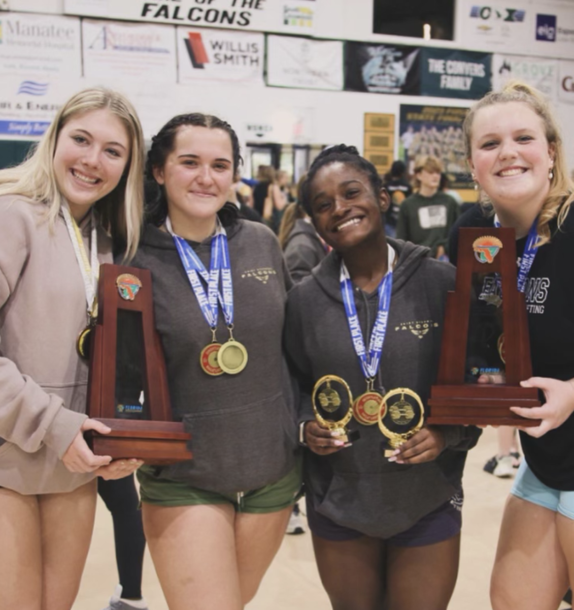 The girls after winning districts in both olympic and traditional. 