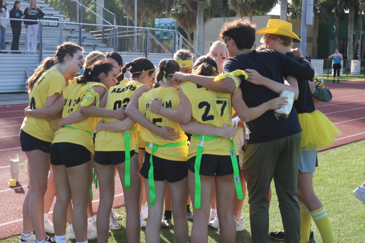 The freshmen huddle up one last time before the tournament starts.