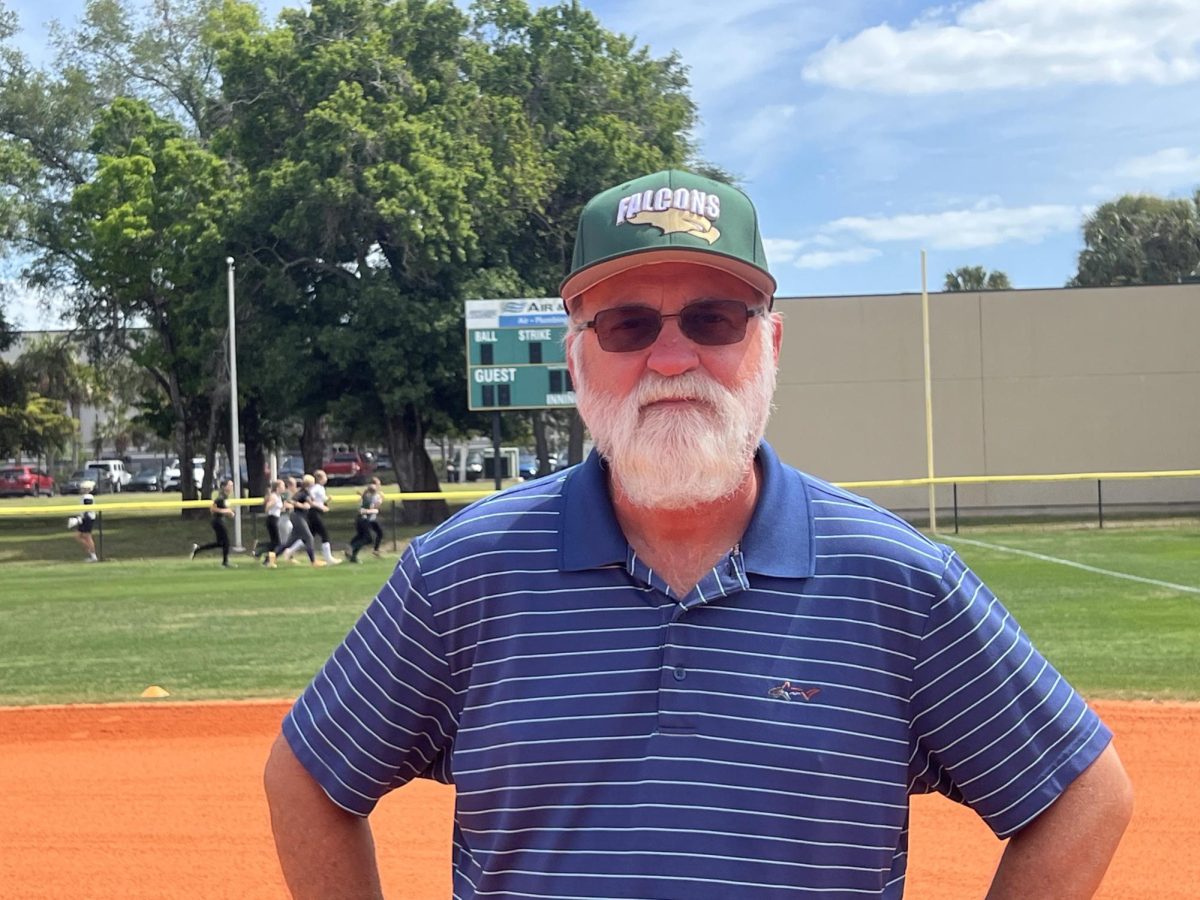 Mr. Paoletti in his environment on the softball field