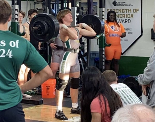 Weightlifter Mark Seklitov lifts off