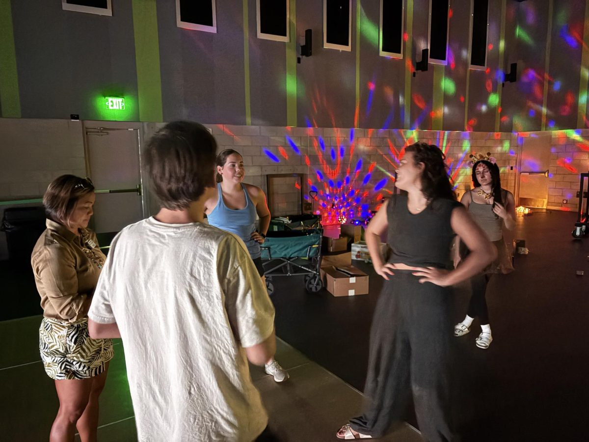 Annette Logan and her fellow sophomore class officers are in the process of setting up for the dance. 