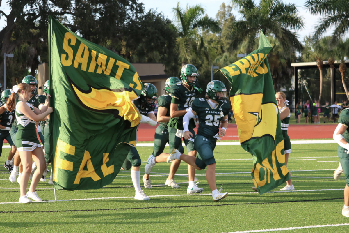 The falcon football team gets hyped before a major match-up. 