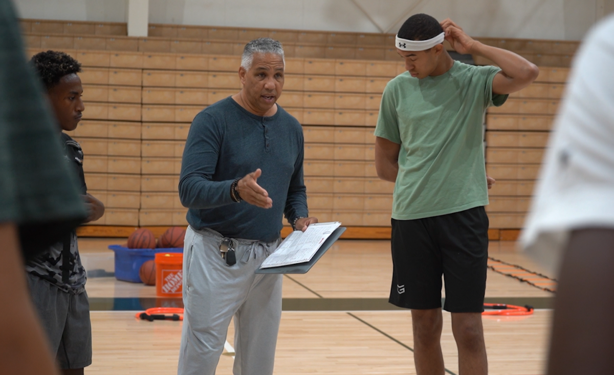 Coach Sutton inspires his players on and off the court. 