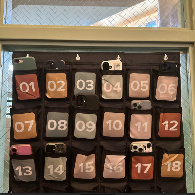 Cell phones are placed in a "caddy" before every period as part of the school's new initiative. 
